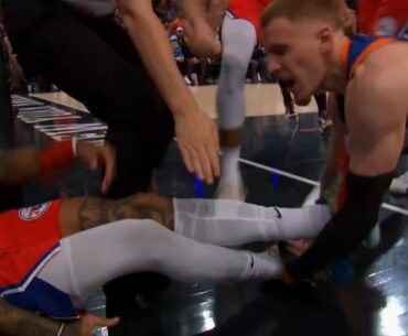 Kelly Oubre Jr can't stop laughing while Donte DiVincenzo trips him and starts fight