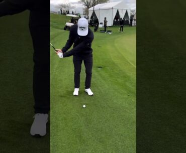 alex noren with a wedge in his hand at a practice area — always electric #golf #short #golfshort