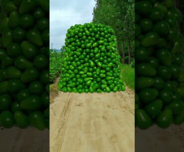 Special effects: Beautiful girl walks and bumps into fruits and they fall