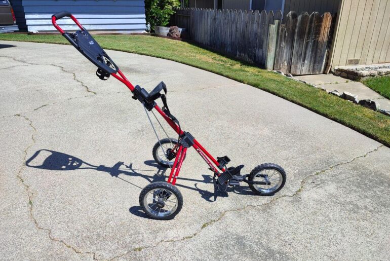 PLEASE HELP! Left push cart by trash can at local course