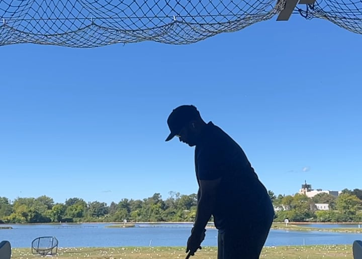 Please help and suggestions welcome. I cannot stop my hands moving towards the ball to initiate the downswing.