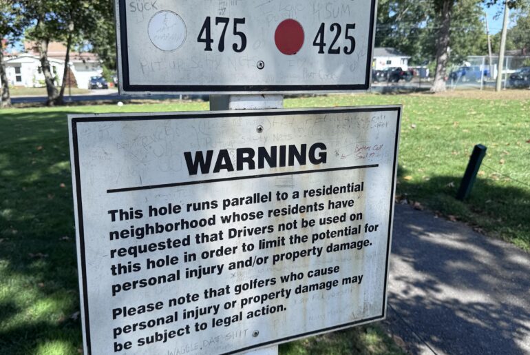 Warning sign at course