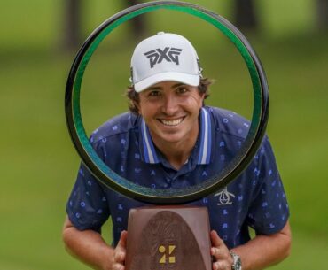 Nico Echavarria poses with the trophy after winning the PGA Tour Zozo Championship at the Narashino Country Club in Inzai