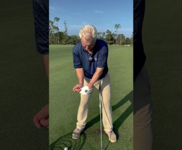 Compress the golf ball with stable arms