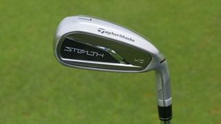 TaylorMade Stealth HD Iron held aloft