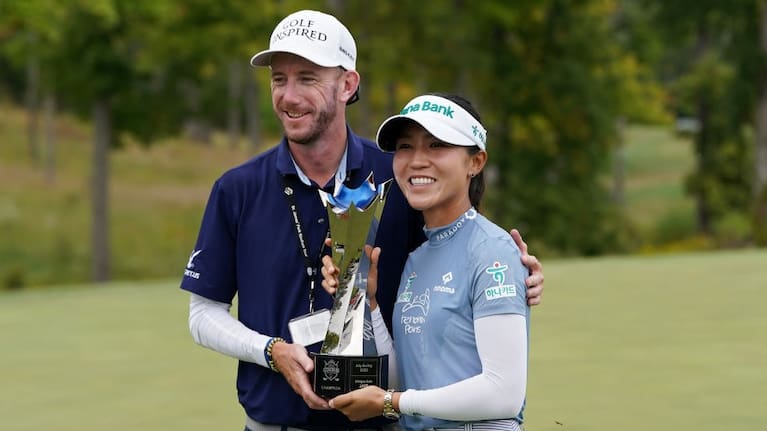 Caddy Paul Cormack and Lydia Ko celebrate victory.