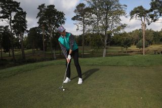 Player addressing the ball with good posture