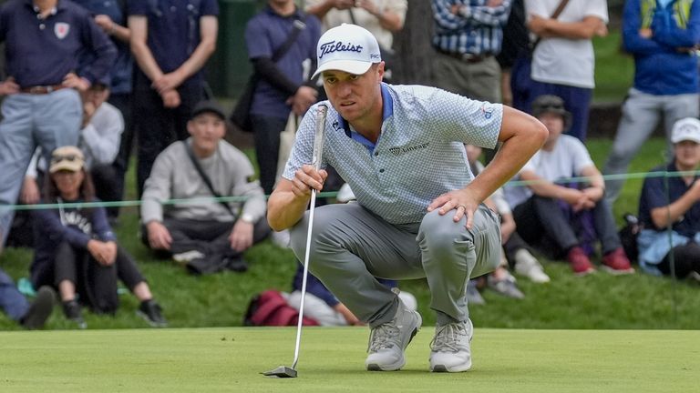 Justin Thomas lines up a putt on the 13th green in the final round of the PGA Tour Zozo Championship at the Narashino Country Club in Inzai